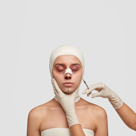 isolated-vertical-shot-female-with-bruises-lifting-marks-gets-injection-face-before-plastic-operation